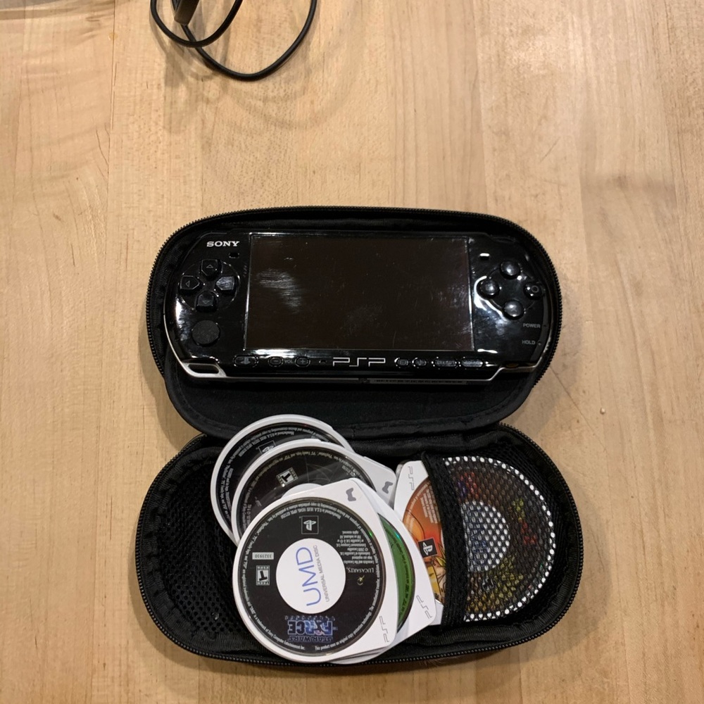 PSP With games and a Charger - Picture 3 of 7
